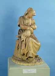 Bäuerin füttert ihr Kind